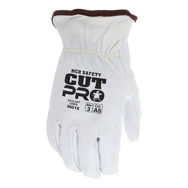 The MCR Safety Premium Grain Goatskin Driver Gloves 3601K (12 pairs) feature brown trim, a durable Kevlar liner for added protection, and have safety ratings printed in black on the back.