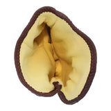 A yellow and brown fabric dog toy shaped like a taco shell, shown from above with the opening visible—its sturdy build is reminiscent of MCR Safety Premium Grain Goatskin Driver Gloves 3601K for lasting play.