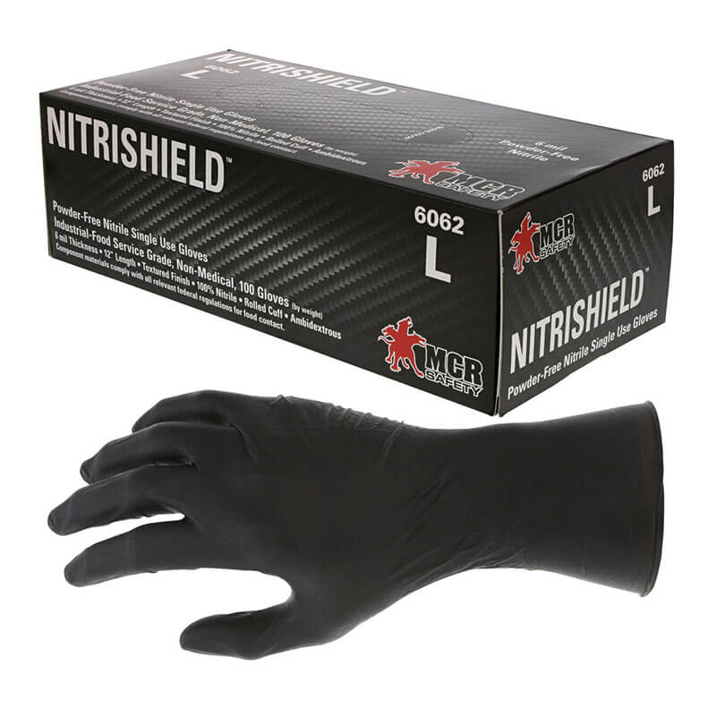 A box labeled "MCR Safety NitriShield Stealth Extra Gloves 6062" (size large) sits next to a single upright black powder-free glove. The box displays the MCR Safety logo and product details. Ten boxes are included per purchase.