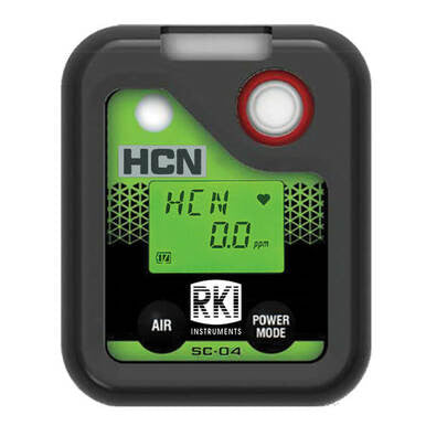 The RKI Instruments SC-04 Series HCN Single Gas Monitor 73-0071 is an intrinsically safe, compact device in black and green that features a digital screen displaying "HCN 0.0 ppm." It has buttons labeled "Air" and "Power Mode," and the brand name "RKI Instruments" is displayed at its base.