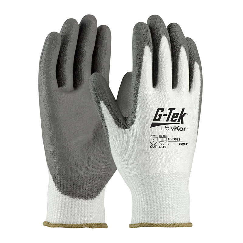 The PIP G-TEK CR Great White 13 Gauge PolyKor Gloves 16-D622 offer cut level 4141 protection, with gray polyurethane-coated palms and fingertips and a white back. These gloves are specially designed for industrial and construction work, providing enhanced cut resistance. Available in a pack of 12 pairs.