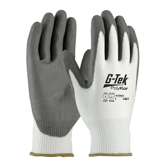 The PIP G-TEK CR Great White 13 Gauge PolyKor Gloves 16-D622 offer cut level 4141 protection, with gray polyurethane-coated palms and fingertips and a white back. These gloves are specially designed for industrial and construction work, providing enhanced cut resistance. Available in a pack of 12 pairs.
