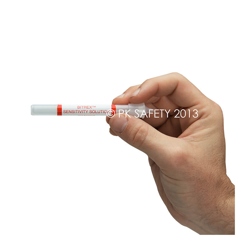 A right hand holds a small capped tube labeled "Allegro Bitrex Sensitivity Solution" from the Allegro Bitrex Respirator Fit Test Kit 2041, designed for OSHA-compliant NIOSH respirator fit testing, against a white background.
