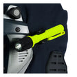 The NSA Enespro LED Light Kit HLITEKIT, in a bright yellow hue, is clipped onto the black safety equipment. The flashlight boasts a sleek design with a textured grip and a clearly visible button. The protective gear features metallic and black elements.