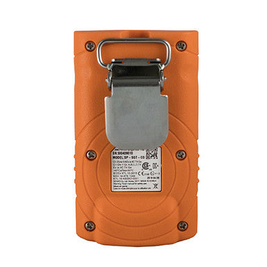 The image shows the back of an orange handheld device, which appears to be the AimSafety CO Single Gas Monitor PM100-CO, equipped with a metal belt clip. A label displaying text and certification marks is visible on the back. The rugged design indicates it is ideal for outdoor or industrial use, likely for carbon monoxide detection.