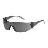 Introducing the PIP Eva Rimless Safety Glasses by Protective Industrial Products, featuring a sleek dark design with clear and pink temples. These glasses boast a rimless style with tinted lenses and smooth curved arms complemented by an anti-scratch coating, along with a subtle pink ribbon emblem on the side.