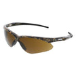 MCR Memphis MP1 Mossy Oak Safety Glasses MOMP11B by MCR Safety feature a camouflage wraparound frame, brown tinted lenses, black nose pads, UV protection, and ANSI Z87.1 compliance—ideal for outdoor or athletic use. 12/box.