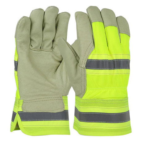 A pair of PIP Pigskin Leather Palm Gloves with a hi-vis bright yellow nylon back and gray reflective stripes across the back of the hands and fingers. The palms are made from durable pigskin leather for enhanced grip, while the thermal lining offers added warmth. These reliable gloves are finished with protective rubberized safety cuffs.