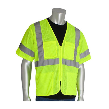 A display mannequin showcases high-visibility apparel: the PIP - Protective Industrial Products ANSI Type R Class 3 Value Zipper Mesh Vest 303-MVG4P. This bright yellow, short-sleeved vest in polyester mesh with silver reflective tape is worn over a black shirt. It features two convenient front pockets, ensuring both practicality and visibility.