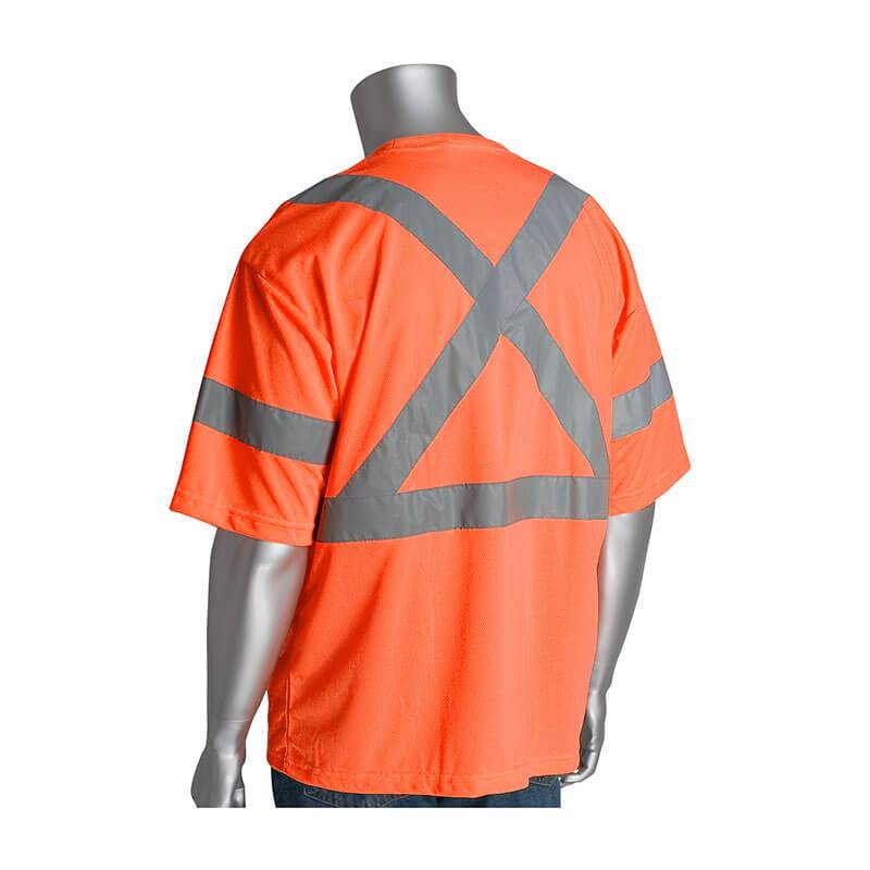 A mannequin showcases the PIP Type R Class 3 X-Back T-Shirt by PIP - Protective Industrial Products, highlighting its orange safety fabric with gray reflective tape arranged in an X pattern on the back, photographed from behind. This design complies with ANSI Type R Class 3 standards for enhanced visibility.