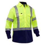 The PIP Bisley Long Sleeve Work Shirt w/X-Airflow 313M6491H by Protective Industrial Products provides exceptional safety with its neon yellow fabric and reflective silver stripes, meeting ANSI Class 3 standards. It features X-Airflow Ventilation for comfort without compromising on high visibility, and is finished with dark blue accents and buttoned front pockets.