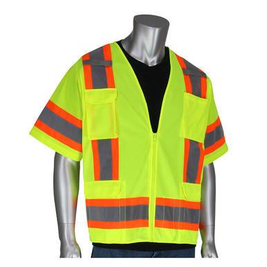 A mannequin displays the PIP ANSI Type R Class 3 Two-Tone Surveyor Vest 303-0500-LY in fluorescent yellow, featuring orange accents and reflective gray stripes. This high-visibility safety vest by Protective Industrial Products includes multiple pockets and a front zipper, layered perfectly over a black shirt.