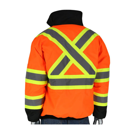 Product Description: The PIP CSA Z96 Two-Tone X-Back, Black Bottom Bomber Jacket 333-1745X by Protective Industrial Products features high visibility and waterproof materials, with reflective gray and yellow stripes forming an X pattern on the back. This bright orange jacket is accented with black on the collar and cuffs and is displayed on a mannequin against a simple white background.