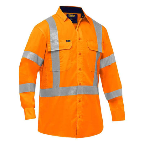 The PIP Bisley X-Back Long Sleeve Work Shirt w/X-Airflow 313M6490X from Protective Industrial Products offers a high-visibility design with reflective silver tape on the chest, arms, and back. This orange shirt also features a button-down front and two flap-covered chest pockets for enhanced functionality.