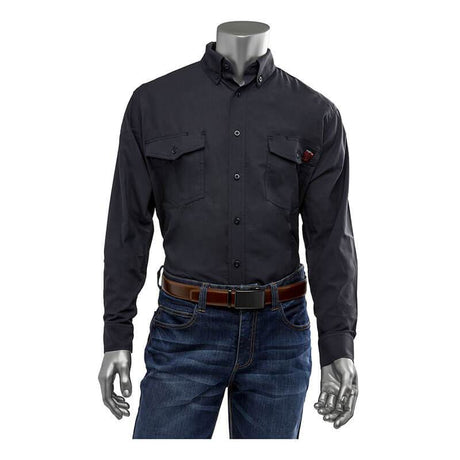 Displayed on a mannequin against a white backdrop is the PIP AR/FR Dual Certified Ripstop Long Sleeve Workshirt 385-FRRS by Protective Industrial Products. This dark shirt, featuring two chest pockets, is paired with jeans and complemented by a brown belt. Its Modacrylic/Cotton/Aramid blend ensures both durability and style.