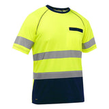 The PIP Bisley Short Sleeve T-Shirt w/Navy Bottom 312M1118T by PIP - Protective Industrial Products is a high-visibility garment featuring fluorescent yellow and navy blue colors, with reflective gray stripes across the chest, arms, and waist. Crafted from performance wicking fabric, it includes a small chest pocket with tab detail and meets ANSI Type R Class 2 standards.