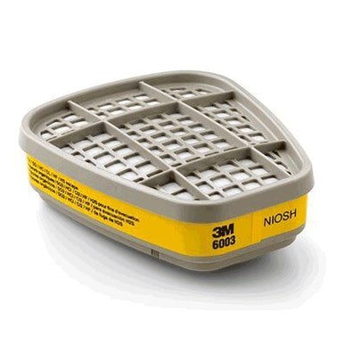 A cartridge filter from 3M, marked with "3M 6003" and "NIOSH," features a gray top and yellow label with a rectangular grid design, indicating its use in respirators for organic vapor protection. The product is identified as the 3M 6003 Organic Vapor / Acid Gas Cartridge (Pair).