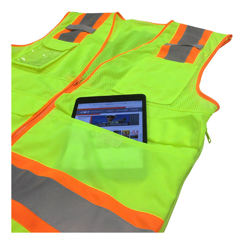 The PIP Hi-Vis Yellow Pocket Surveyors Tech Vest 302-0700LY features orange and silver reflective stripes and a large pocket with a tablet partially visible inside.