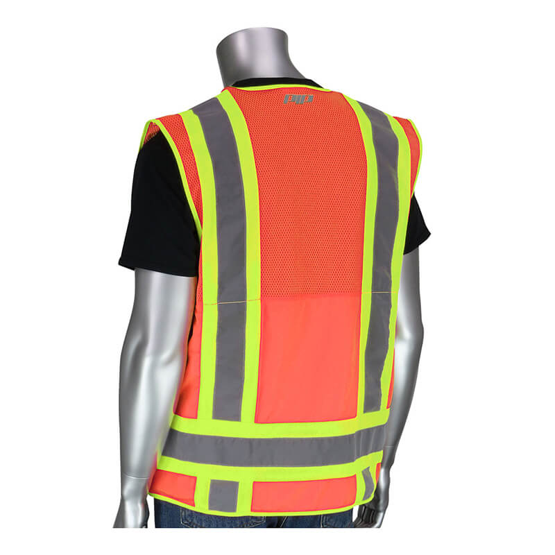 A silver mannequin displays the PIP Hi-Vis Orange Pocket Surveyors Tech Vest 302-0700OR over a black shirt, shown from the back. This PIP vest features ANSI/ISEA 107 Class 2 certification with yellow and gray reflective stripes.