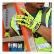 A construction worker, face partially visible, holds an orange ladder while wearing a neon yellow safety vest and bright MCR Safety Predator Impact 1 MAXGrid Hi-Vis CutPro Gloves PD4900 with black detailing.
