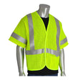 A mannequin displays the PIP ANSI Type R Class 3 AR/FR Mesh Vest 305-3100 from Protective Industrial Products, a high-visibility garment that features a bright yellow, short-sleeved safety vest with reflective silver stripes over a black shirt. The mesh material provides comfort while adhering to ANSI Type R Class 3 standards for improved visibility.