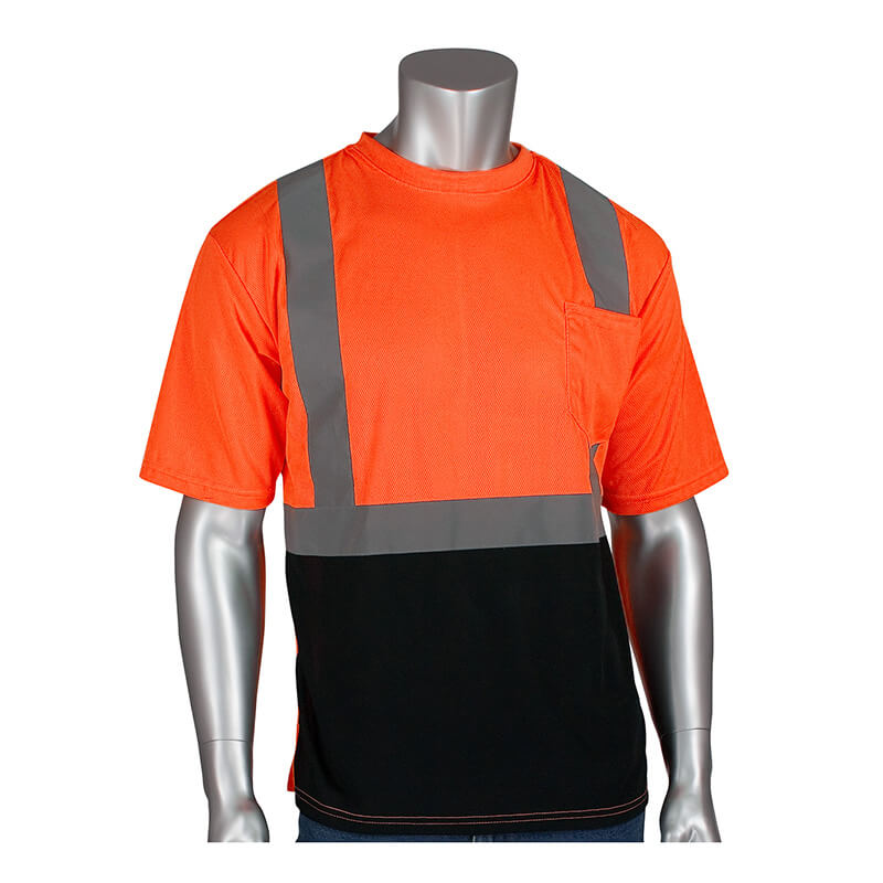The mannequin is dressed in a PIP Class 2 UV Black Bottom Crew Neck T-Shirt 312-1250B-OR. This vibrant orange and black Hi-Vis workwear, made from moisture-wicking polyester, features reflective gray stripes to ensure ANSI Class 2 visibility and comfort at work.