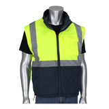 A mannequin displays the PIP Black Label 4-in-1 Reversible Windbreaker, a high-visibility safety vest featuring bright yellow and reflective gray stripes over a black shirt. The windbreaker includes a zip-up front and black lower pockets, meeting Class R3 visibility standards for enhanced safety.