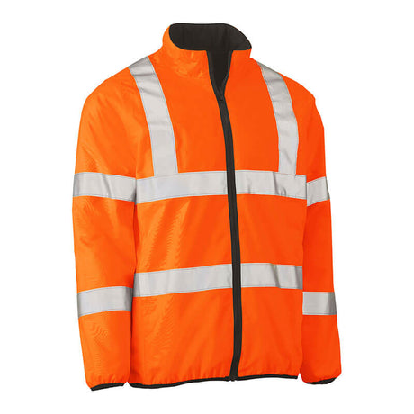 Introducing the PIP Bisley ANSI Type R Class 3 Reversible Puffer Jacket 333M6350H by Protective Industrial Products—this vibrant orange jacket is designed to meet high-visibility requirements with its reflective silver stripes around the chest, arms, and waist. It combines style and practicality with a black zipper and a standing collar, making it ideal for any setting.