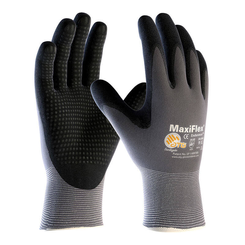 Two black and gray PIP MaxiFlex Endurance Micro-Foam Grip Glove 34-844 gloves are displayed upright, front and back visible. They feature a snug fit, textured nitrile-coated palms, and branding on the back.