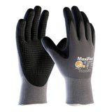 Two black and gray PIP MaxiFlex Endurance Micro-Foam Grip Glove 34-844 gloves are displayed upright, front and back visible. They feature a snug fit, textured nitrile-coated palms, and branding on the back.