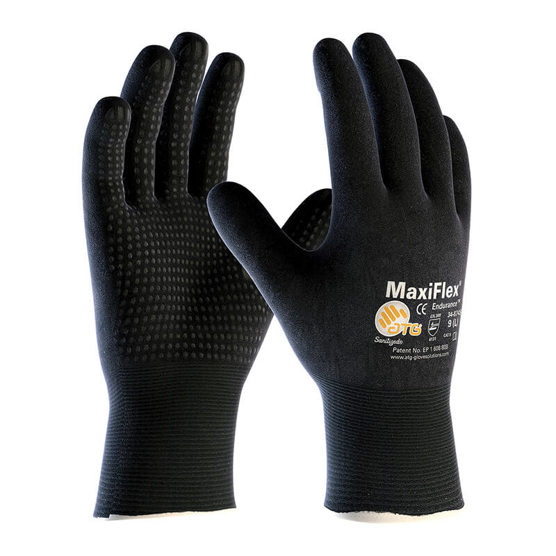 The ATG MaxiFlex Endurance Micro-Foam Nitrile Grip Glove 34-8745, available in a pack of 12 pairs from PIP - Protective Industrial Products, combines black and orange colors with a textured grip on the palms and fingers. Featuring white text and symbols, these gloves are Skin Safe Certified. They are crafted with Micro-Foam Nitrile to ensure both durability and comfort for extended wear.