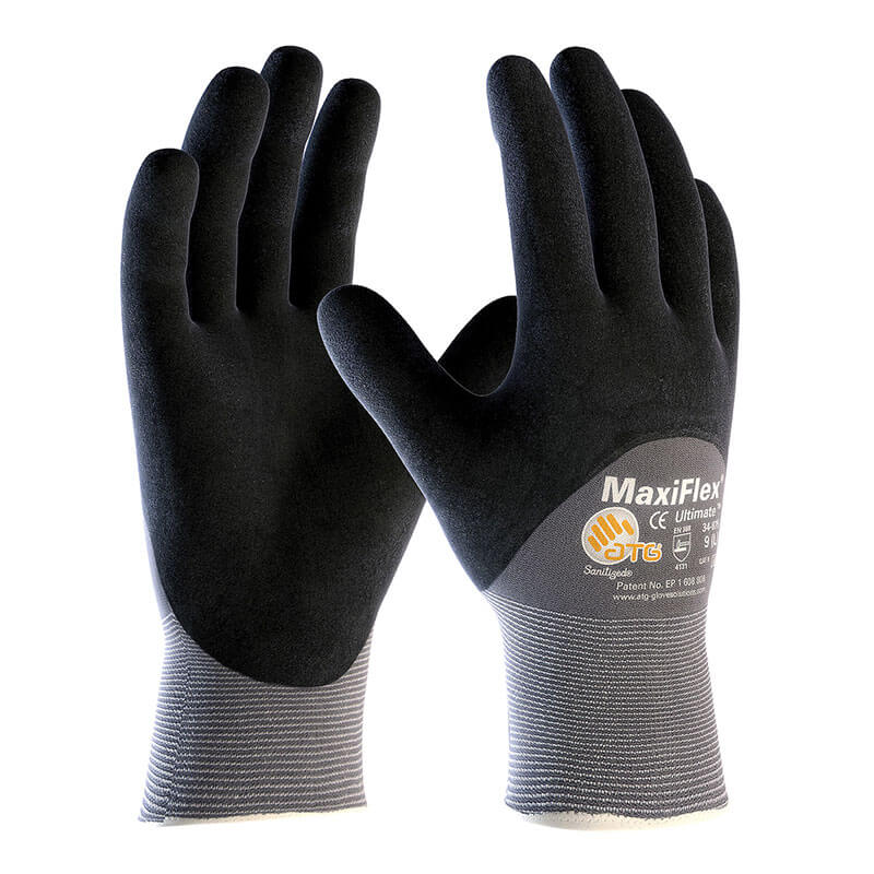 A pair of PIP ATG MaxiFlex Ultimate Micro-Foam 3/4 Coated Palm Nitrile Gloves 34-875 (black/gray) is shown upright with palms forward, displaying logos and text on the cuffs.
