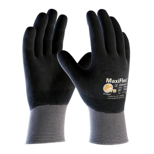 A pair of PIP MaxiFlex Ultimate Fully-Coated Micro-Foam Grip Glove 34-876 (12 pairs) in black and gray is shown upright, featuring the brand name and logo on the back of one abrasion resistant glove.