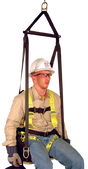 A person equipped with comprehensive safety gear, including a helmet, goggles, gloves, and a harness, is suspended in the French Creek Deluxe Work Seat with Comfort Seat Back 4151. This setup includes fall protection and highlights a high-visibility vest worn over casual attire.