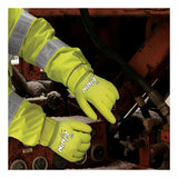 A person in a hi-vis jacket wears MCR Safety Ninja Ice Hi-Vis Gloves N9690HV while operating machinery outdoors in snowy conditions. The gloves are bright yellow and designed for visibility and warmth.