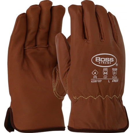 A pair of brown PIP Boss Xtreme Oil Armor Goatskin/Fleece Gloves KS9911KP, featuring white text displaying safety ratings and the PIP logo. With reinforced stitching and Oil Armor design, these gloves are crafted for superior protection.