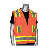 A gray mannequin displays the PIP ANSI Type R Class 2 Two-Tone Mesh Surveyors Vest 302-0500M from Protective Industrial Products. This high visibility vest features a vibrant orange hue with reflective yellow and gray stripes over a black shirt. Designed for safety, the surveyor's vest includes pockets and a front zipper, exemplifying hi-vis apparel.