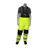 A mannequin is outfitted in PIP Insulated Bib Pants with Black Trim 318-1775, featuring high-visibility yellow pants with reflective strips and black accents. The pants are paired with an insulated black bib and braces, along with a dark grey T-shirt. This winter workwear piece from PIP - Protective Industrial Products ensures you stay seen and warm on the job.