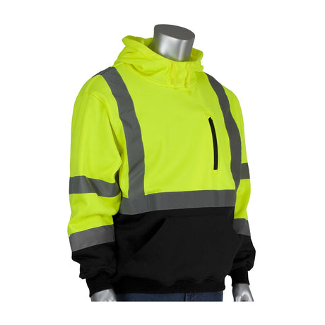 The PIP Hooded Pullover Sweatshirt w/Black Bottom 323-1350B from PIP - Protective Industrial Products is displayed on a silver mannequin. This high-visibility yellow and black safety hoodie meets ANSI Class 3 certification standards and features reflective tape and stripes, along with a front pocket and partial zipper, designed for maximum visibility and safety.