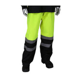 A mannequin displays the PIP Viz Waterproof Pants with Black Bottoms 353-1202 in a vibrant yellow hue, featuring black and reflective gray stripes near the knees for high visibility. The ripstop shell design enhances durability, and the ensemble is finished off with sturdy black boots and a hint of a coordinating black jacket at the top.