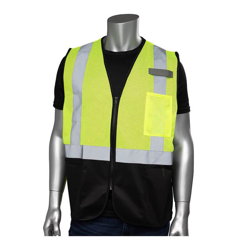 The PIP Type R Class 2 Three Pocket Mesh Vest w/Black Bottom Front 302-V173B, from PIP - Protective Industrial Products, is displayed on a mannequin. Showcasing its vibrant neon yellow color with silver reflective tape and mesh design, the vest is worn over a black shirt, making it perfect for construction safety by ensuring maximum visibility and protection.