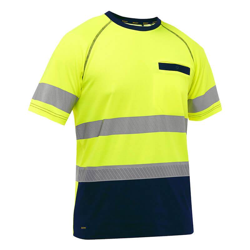 This ANSI/ISEA 107 Class 2 high-visibility safety shirt, the PIP Bisley Short Sleeve T-Shirt w/Navy Bottom 312M1118T from Protective Industrial Products, features bright yellow fabric with reflective gray stripes across the chest, arms, and hem. It includes a small black pocket on the left side of the chest and is treated with antimicrobial protection for enhanced safety.