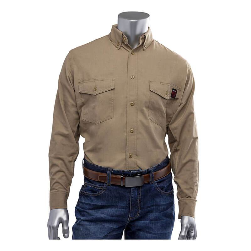 A mannequin displays the PIP AR/FR Dual Certified Ripstop Long Sleeve Workshirt 385-FRRS by Protective Industrial Products, crafted from a Modacrylic/Cotton/Aramid blend. The khaki shirt features two chest pockets and a small logo on the left pocket. It is styled with blue jeans and a brown belt, set against a plain white backdrop.