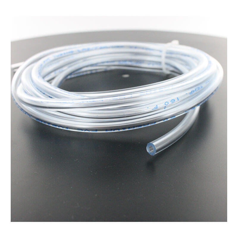 A coiled, transparent BW Technologies by Honeywell Tygon Calibration Hose 1 ft (C2-HOSE1-1) with blue markings rests on a black surface, its hollow end visible—designed as a Gas Detector Accessory for GasAlertMicroClip X3 devices.