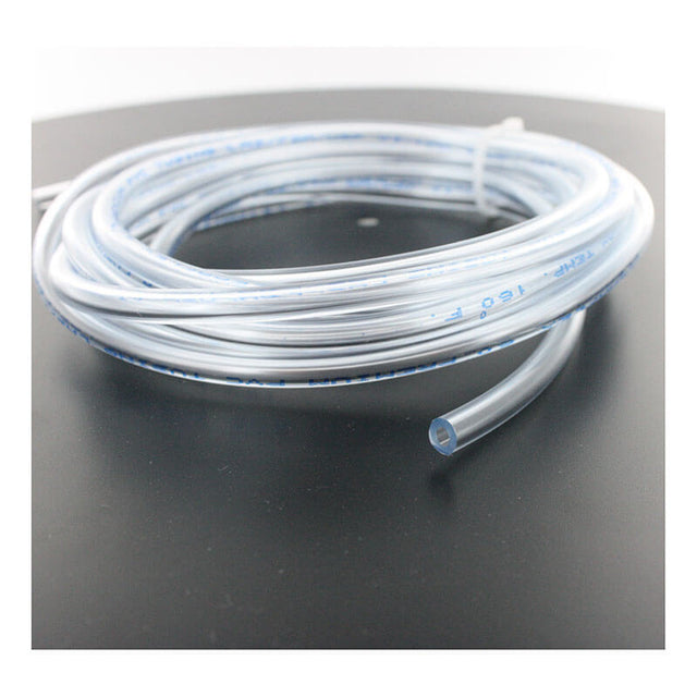 A coiled, transparent BW Technologies by Honeywell Tygon Calibration Hose 1 ft (C2-HOSE1-1) with blue markings rests on a black surface, its hollow end visible—designed as a Gas Detector Accessory for GasAlertMicroClip X3 devices.