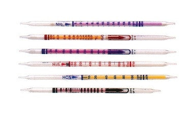 Six color-coded gas detector tubes, including the Honeywell Water Vapor 6 - 40 lbs/MMCF Tubes H-10-120-20 by BW Honeywell, are arranged horizontally. Each tube is marked with graduations and labeled with chemical abbreviations such as "NH3" and "H2S," featuring different colored sections to indicate their detection levels when used with a piston hand pump.