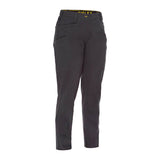 The PIP Bisley Women's Stretch Ripstop Vented Work Pants by NSA are displayed against a plain white background. These gray pants are crafted with stretch ripstop fabric for increased durability and feature multiple pockets along with UPF 50+ protection. The waistband is highlighted by yellow lettering, and they incorporate X-Airflow Ventilation to ensure breathability.