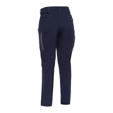 The PIP Bisley Women's Stretch Ripstop Vented Work Pants from NSA, shown from the back, are available in dark blue and feature multiple pockets with side zippers. Designed for functionality and durability, they include X-Airflow Ventilation and offer UPF 50+ protection, making them ideal for outdoor adventures.