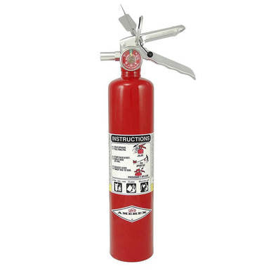 The Amerex 2.5 lb ABC Fire Extinguisher with Vehicle Bracket B417T, featuring a distinctive red design with a silver handle and nozzle, includes a comprehensive instruction label that outlines usage steps and important safety symbols. It also showcases the manufacturer's logo at the bottom. Designed to be versatile for various situations, it comes with a vehicle bracket for secure mounting.