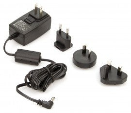 The BW Universal Power Supply Adapter POWER-UPS-01, by BW Honeywell, is a versatile AC unit that comes in black and includes a detachable cord and four interchangeable plug types to fit various international outlets. Perfect for travelers, it is showcased against a white background to highlight its adaptability in batteries and chargers.